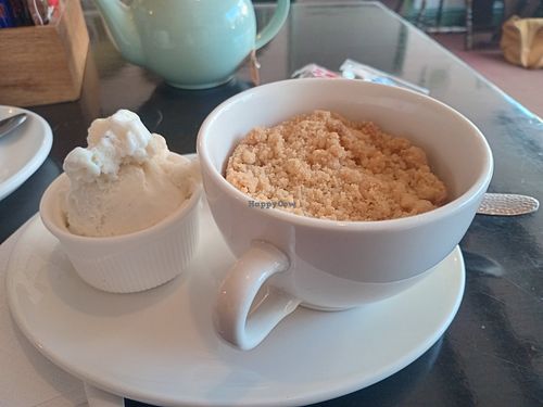 Hot Apple crumble with vegan vanilla icecream at The White Hare Cafe in Kirkby Stephen