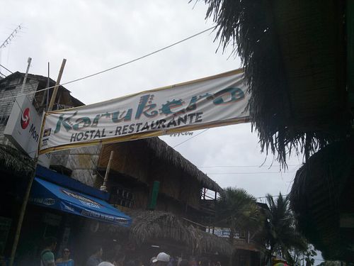 Can't miss this place - there's a big banner hanging over the street. at Karukera in Montanita