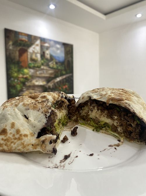 Burrito (El Próximo Día) Todavía Estaba Rico - Minus Too Much Cheese for My Liking Suadero Burrito 🌯 Muy Grande   at Karma Vegano in Mexico City