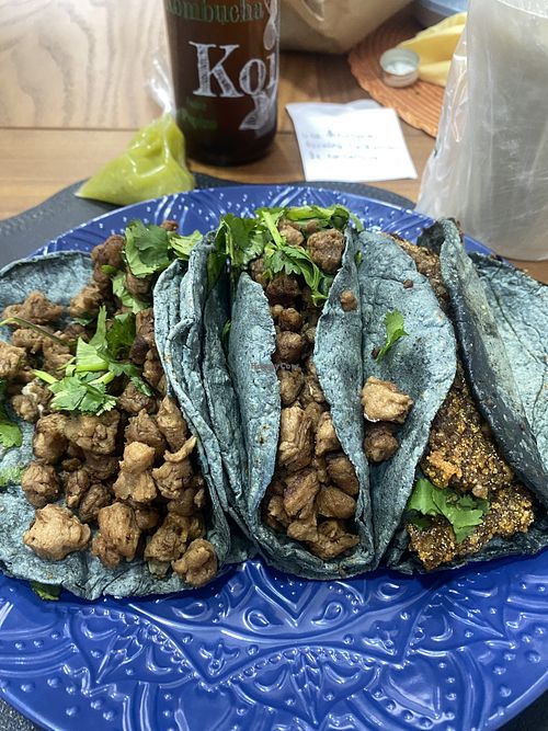 Orden a domicilio- tres tacos (dos de suadero y uno de milanesa), cómo es mucho technically son como seis tacos!  at Karma Vegano in Mexico City