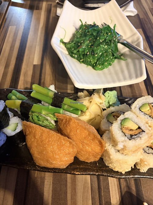 Tofu sushi, asparagus sushi, avocado tempura rolls, avocado and cucumber maki. Seaweed salad.  at Sakura Japanese Restaurant in Belfast