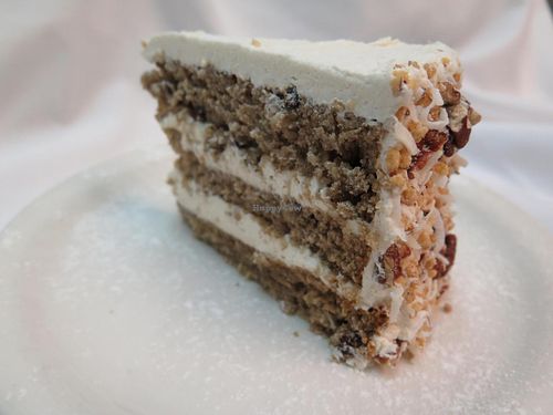 Hummingbird Cake
banana cake with pecans, coconut and pineapples layered with a malted-cream cheese icing. at Ellen's Stardust Diner in New York City