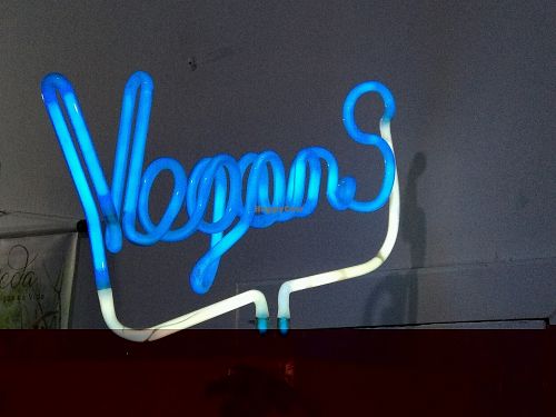Neon sign inside Lar Vegetariano Vegan  at LAR vegan in Sao Paulo