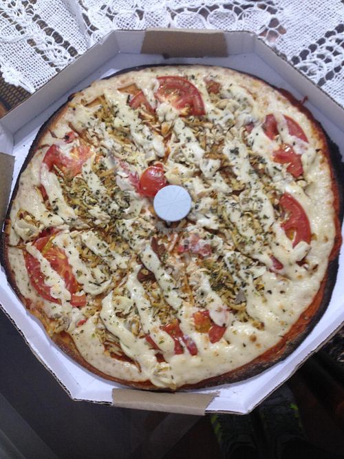 ''Da casa'' pizza, from the delivery service. at LAR vegan in Sao Paulo