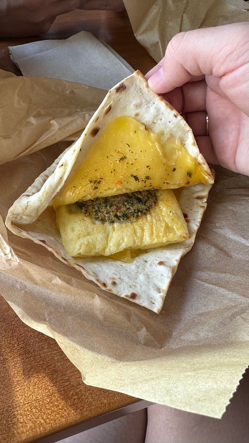 Vegan just egg pesto flatbread at Caribou Coffee  in Atlanta