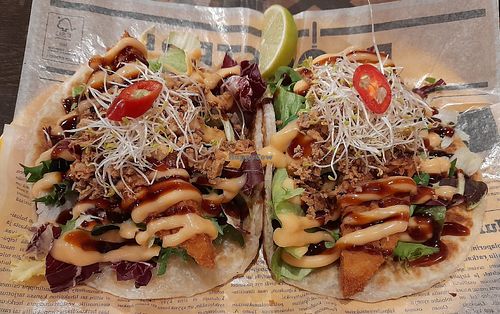 Mamak roti: vegan chicken, crispy roti bread, mixed salad, roasted onion, chili mayonnaise, teriyaki sauce and lime. at Street Canteen in Espoo