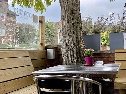 outside seating at Lu-Ma Cafe in South West London