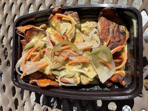 The movie theater nachos are AMAZING   at Pretty Baked  in Pensacola