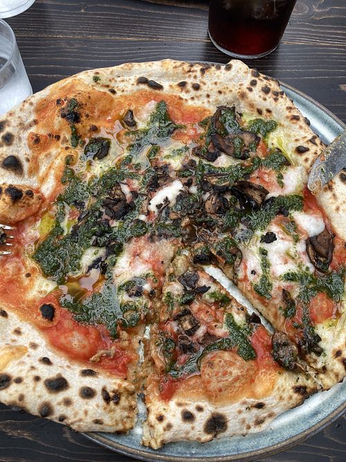 Vegan pizza w mushrooms, basil oil, almond cheese   at Stenmarks Restaurang & Växthus in Trelleborg