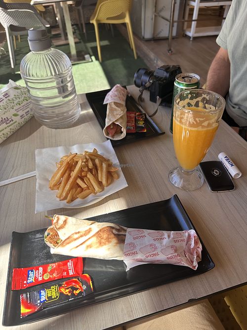 Two felafel wraps (maybe should have asked to have hummus in them) and chips.  at MisterKamil in Ouarzazate