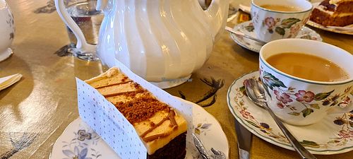Biscoff cake and tea with soya milk at Meadgate Cafe in Bath