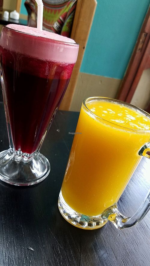 purple corn juice and a papaya juice at Heart Cafe in Ollantaytambo
