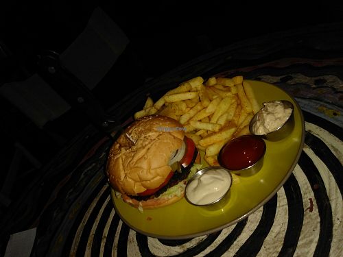 Burger and fries (yup, it's a bit dark in there) at Doobie's Vegan Bar in Haifa