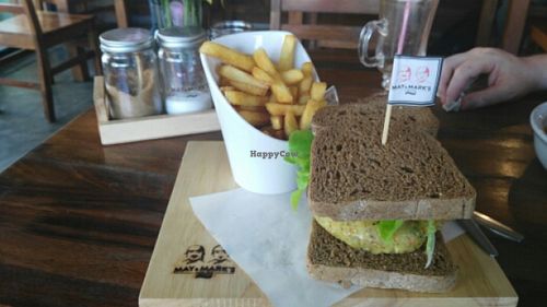 Veggie burger with vegan brown bread and fries. at May and Mark Restaurant in Krabi