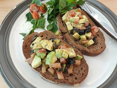 Avocado, tomatoes and olives on toast at May and Mark Restaurant in Krabi