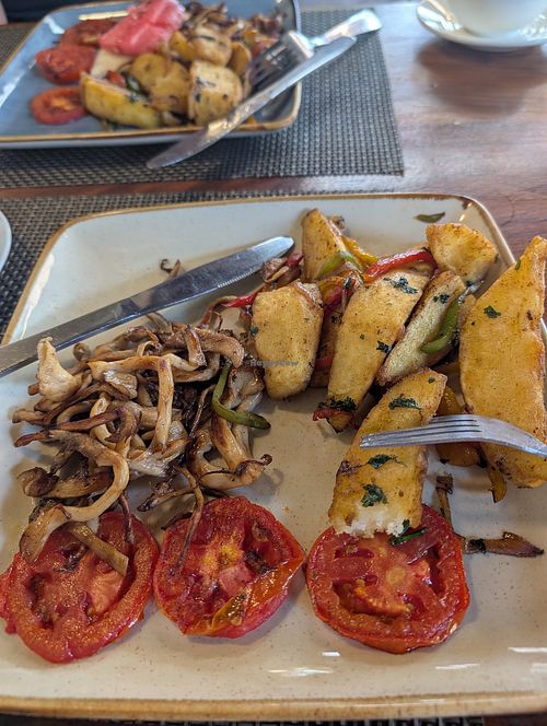 Breakfast the chef made separately for us. Mushroom, potato wedges, and lots of fruits at Revive by Ark Organics in Kampala