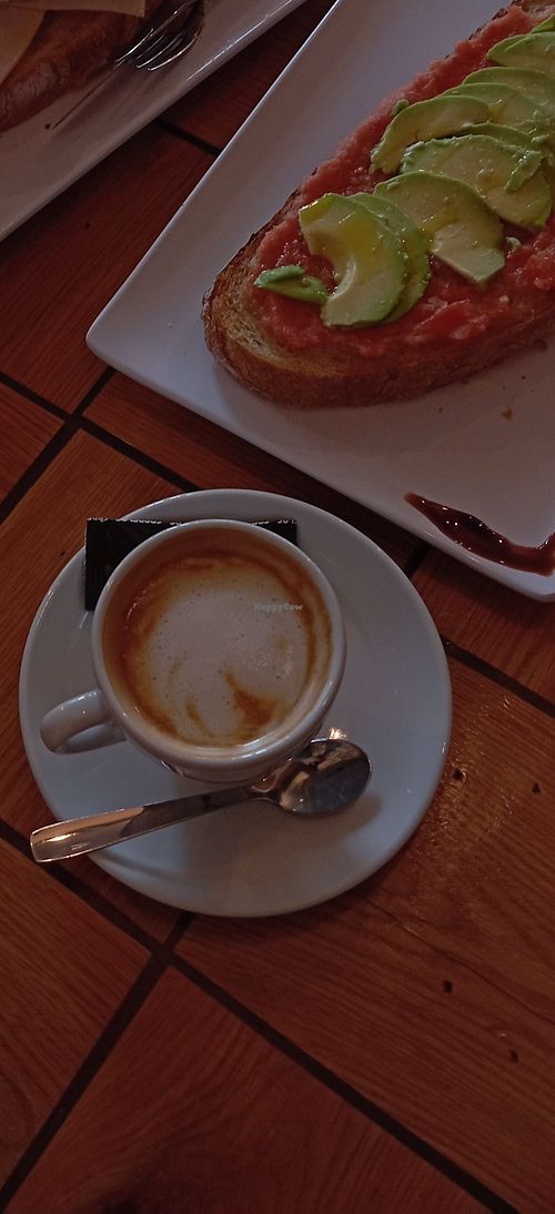 Café soia e tosta de aguacate con tomate. at Cafetería Antoxo in Xove