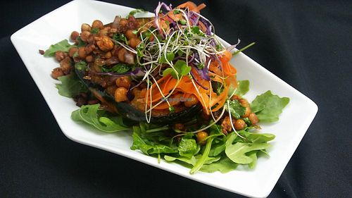 Chefs choice for Dinner: #Acorn #Squash #BuddahBowl  #Roasted #Stuffed #Acorn #Squash filled with #SweetPotatoes #ChickPeas #Onion and #Arugula in a #GingerSoy #Broth!! #MeatlessMonday #Vegan & #GlutenFree at Cafe Evergreen in Nokomis
