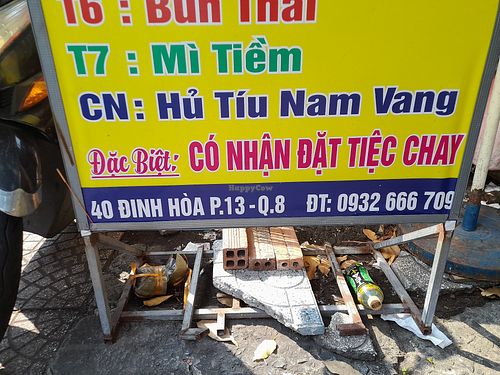 Menu board outside. Address. Phone number at Hồng Cúc in Ho Chi Minh City