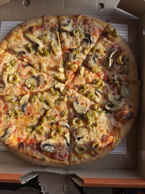Mushrooms and Green Olives on a pizza with dairy free Cheeze   at Pizza Pizza in Mississauga