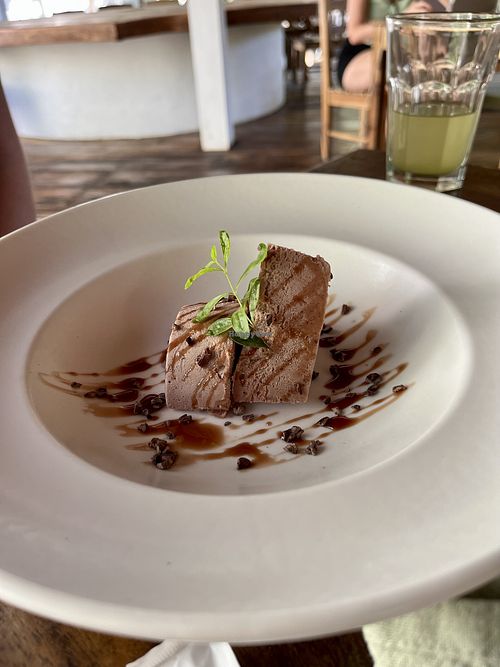 Vegan dessert (seasonal, this one was chocolate mousse with cacao from the garden) Looks so normal, but truly one of the best things I’ve ever tasted.   at The Grand Mango Restaurant in Tola