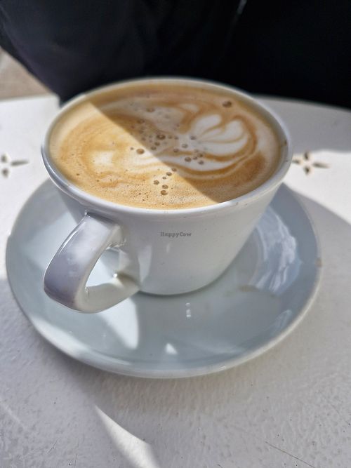 Oat milk latte at The Orangery Garden Cafe in Torpoint