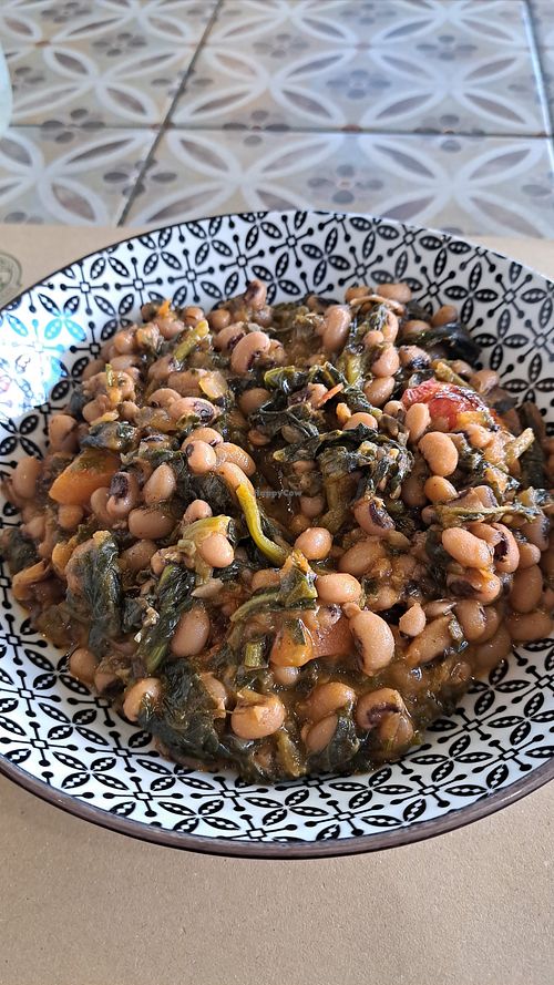 Beans with spinach, herbs and tomatoes at Gyro in Athens