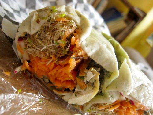 Tofu chimichurri sandwich from the Petit Végo counter inside the restaurant. at Resto Vego in Montreal