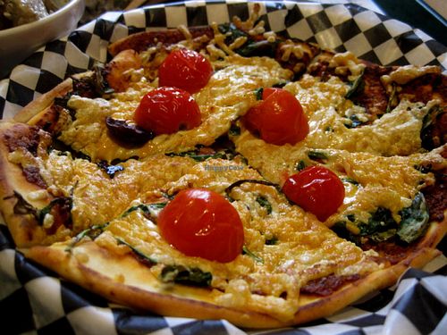 Vegan Pizza on Naan Bread with Daiya cheese. Amazing. at Resto Vego in Montreal
