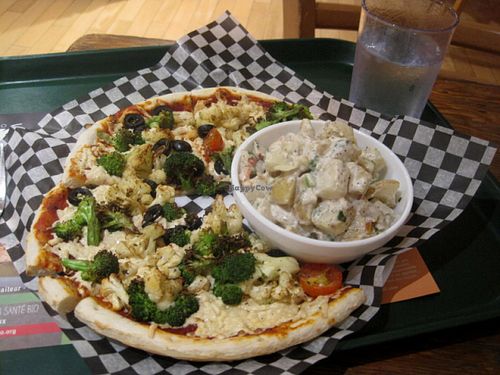 Vegan pizza with Daiya and marinated veggies. Excellent, but maybe too much cheese. at Resto Vego in Montreal