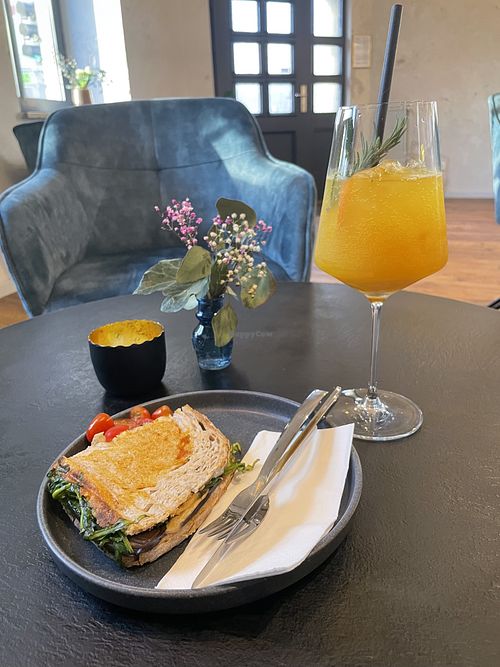 Toasted antipasti sandwich with homemade lemonade   at Bato Café in Munich