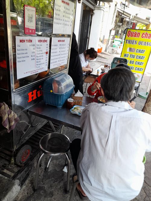 Outside dining area. On the pavement outside the house/ restaurant at Quán chay Thiện Quang in Ho Chi Minh City