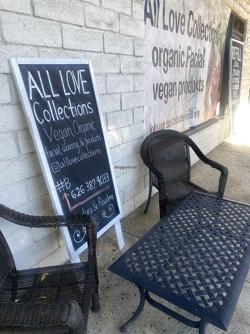 Outdoor Seating Area w/Socials and Refill Station Signs  at All Love Collections in Glendora