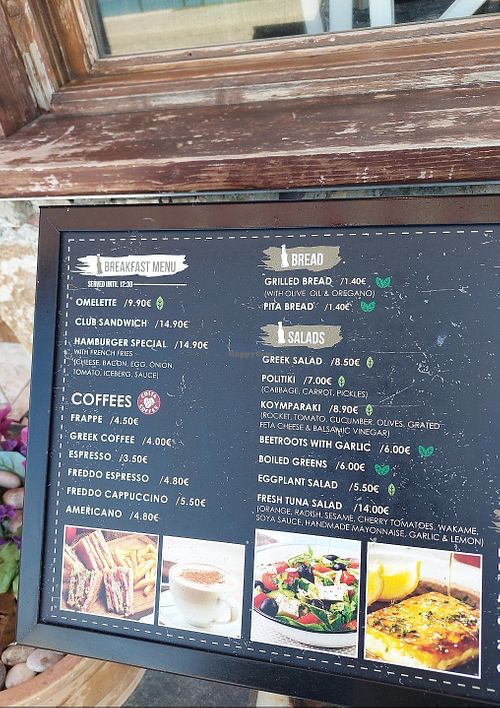 Clearly labeled vegan and vegetarian options at Koumparaki in Rhodes