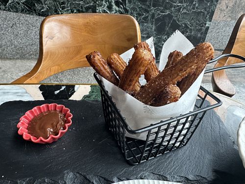 Vegan churros and chocolate sauce   at Hause Rooftop Senopati in Jakarta