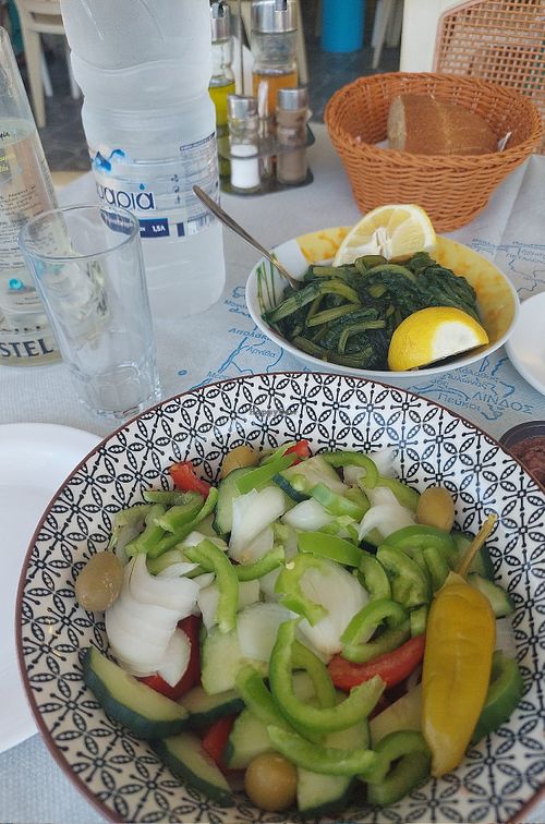 Horta (boiled greens) and Greek salad without feta at Johnny's Grill Taverna in Rhodes