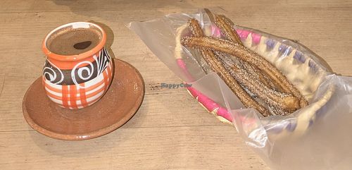 Hot chocolate (with hot water) and vegan churros with sugar and cinnamon. at Xocol-Na Chocolate & Churros Cafeteria in San Cristobal De Las Casas