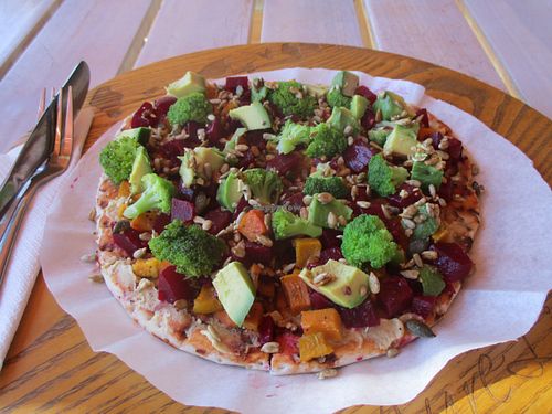 So Vegan Foccaccia - a show of colors and flavors, a veggie garden on your plate. Base takes hummus and the mix of butternut, beetroot, avocado, vanilla seeds and pumpkin seeds give the foccaccia an exquisite bittersweet taste. at Aurelie's Health and Lifestyle Cafe in Johannesburg