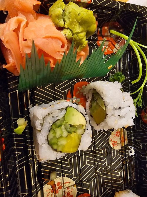 Vegetable roll (avocado, cucumber & pickled turnip, garnished with black & white sesame seeds)

Includes Wasabi & pickled pink ginger & soy sauce packet(soy sauce not pictured). at Kyo Ramen & Poke Bowl in Lombard