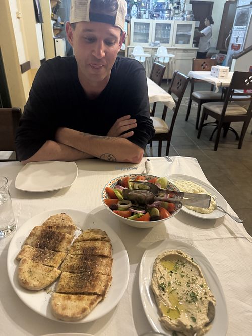 Greek salad and humous and pita breakd  at The Old Monolithos Taverna in Rhodes