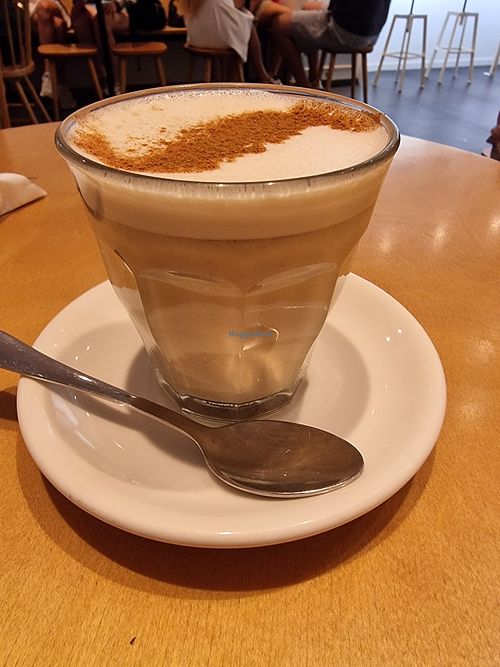 Oatmilk chai latte at Fábrica Coffee Roasters in Cascais