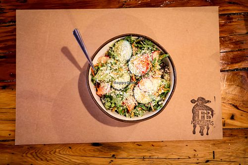 Our Garden Salad made with fresh spring mix, sliced radish, shredded carrots, tomato, cucumber and lemon vinaigrette. Can be served without cheese. at Farm Burger in Memphis