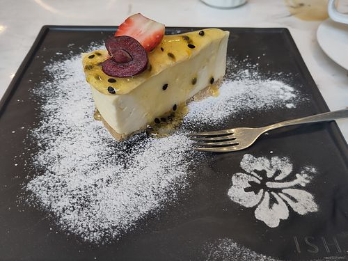 Mango cheesecake at Isha Patisserie in Leicester