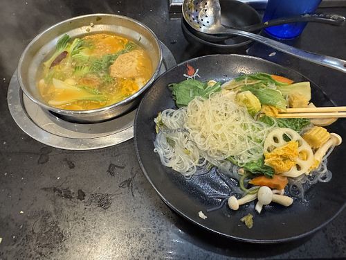 Vegan broth rice noodles and vegetables   at Hot Pot & BBQ in Fort Myers