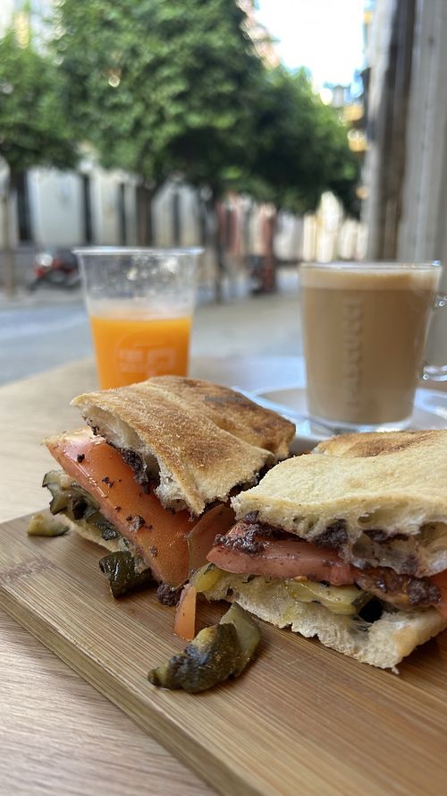 Focaccia, orange juice and flat white deal  at Lunula Crossanteria y Focacceria in Sevilla
