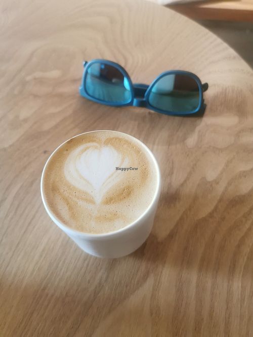 Decaf cappuccino with oat milk at The Organic Way in Ericeira