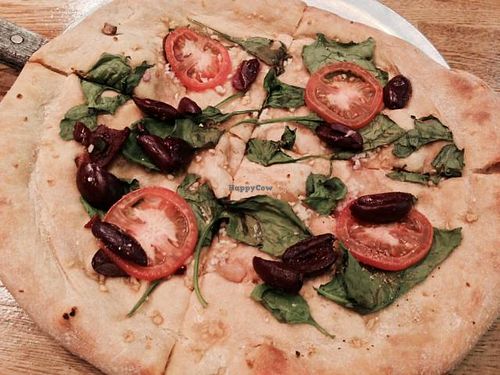 vegan pizza w spinach, black olives & tomatoes at Mellow Mushroom in Chattanooga