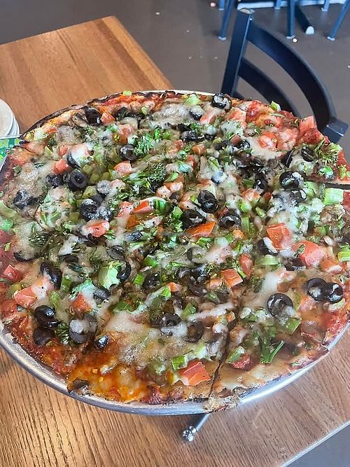 Veggie pizza with vegan cheese at Sonny's Pizzeria And Sports Bar  in Naples