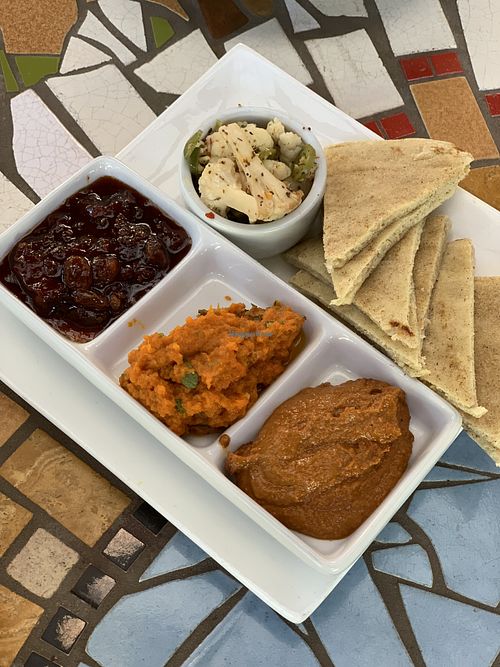 MEZE PLATE
tomato chutney, muhammara, carrot-miso hummus,
giardiniera, housemade naan | 13 v at Robin's Restaurant in Cambria