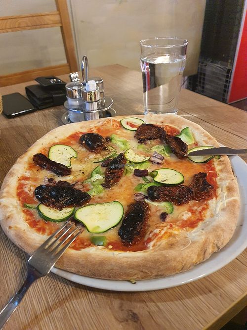 Pizza with vegan cheese at Pizzerija In Gostilna Matiček in Radovljica